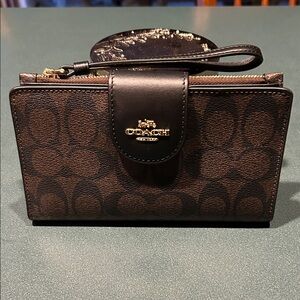Coach Dark Brown Phone Wallet Wristlet with Black Trim - Never used